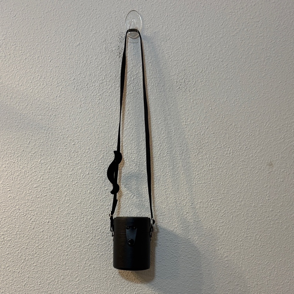 Sigma Black Cylinder Crossbody Bag
